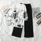 White Graphic Printed T-shirt with Sold Black Trouser Dress